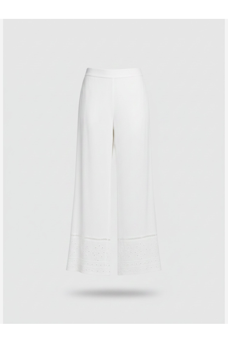 White two-piece set: square-neck top with tie straps and wide-leg pants, intricate embroidery, lightweight fabric.