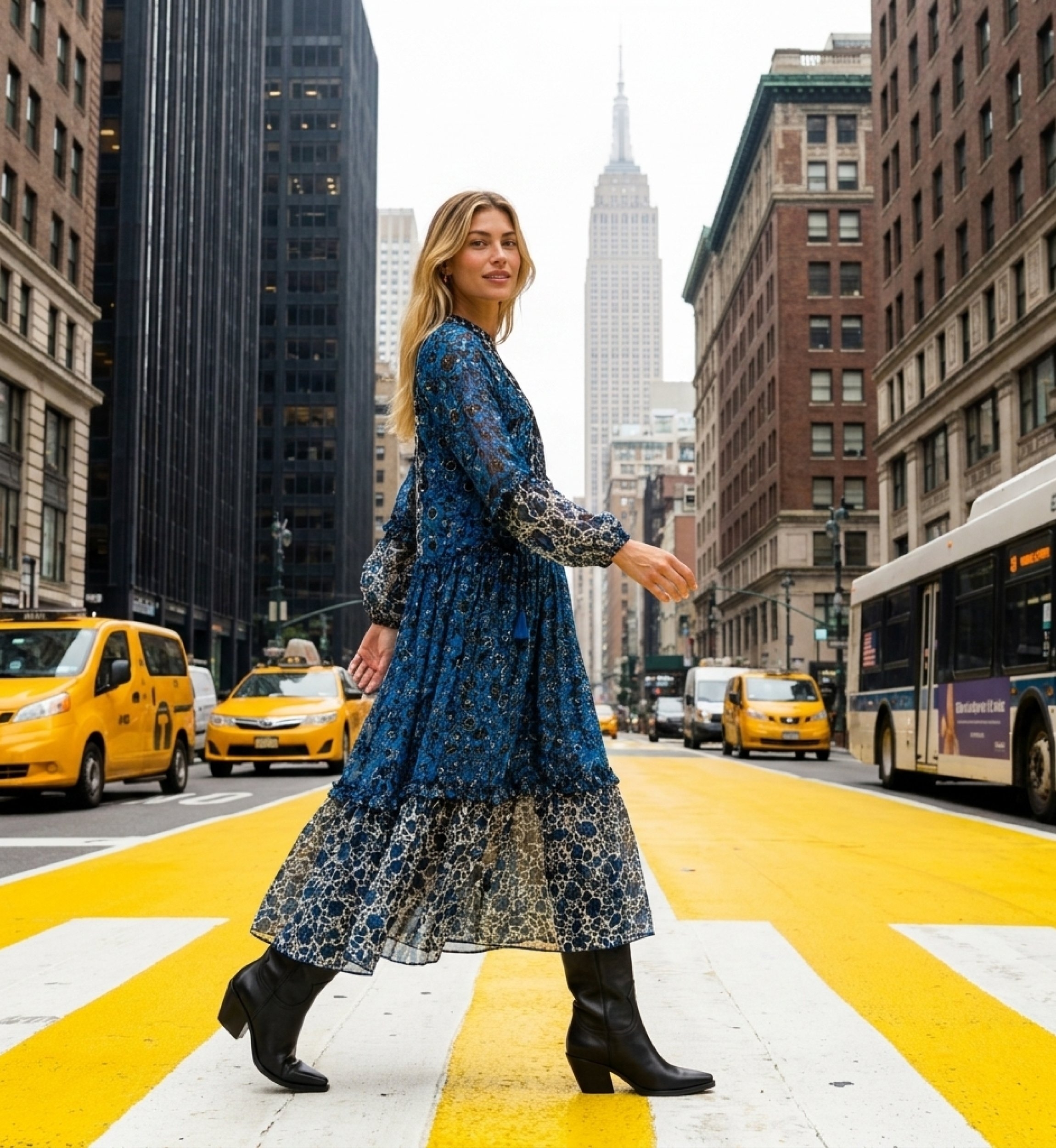Long-sleeve tiered maxi dress with blue, black & white floral pattern, loose sheer fabric, street style.