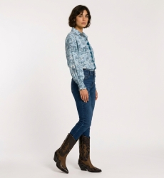 Light blue safari animal print button-up shirt, long puffed sleeves with shirred cuffs, three-quarter view.