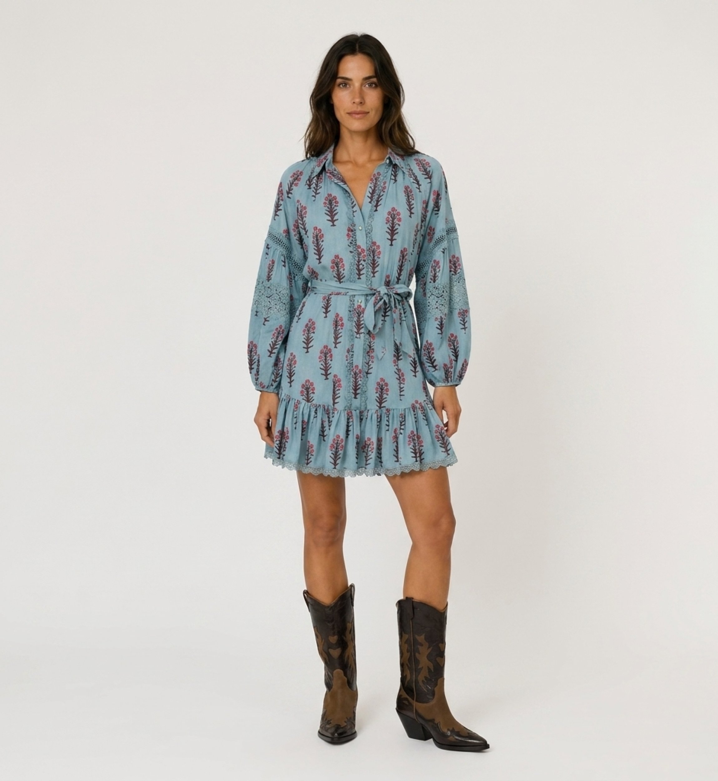 Front view light blue floral mini-dress with collar, long balloon sleeves, lace inserts, button-down front, tied waist.