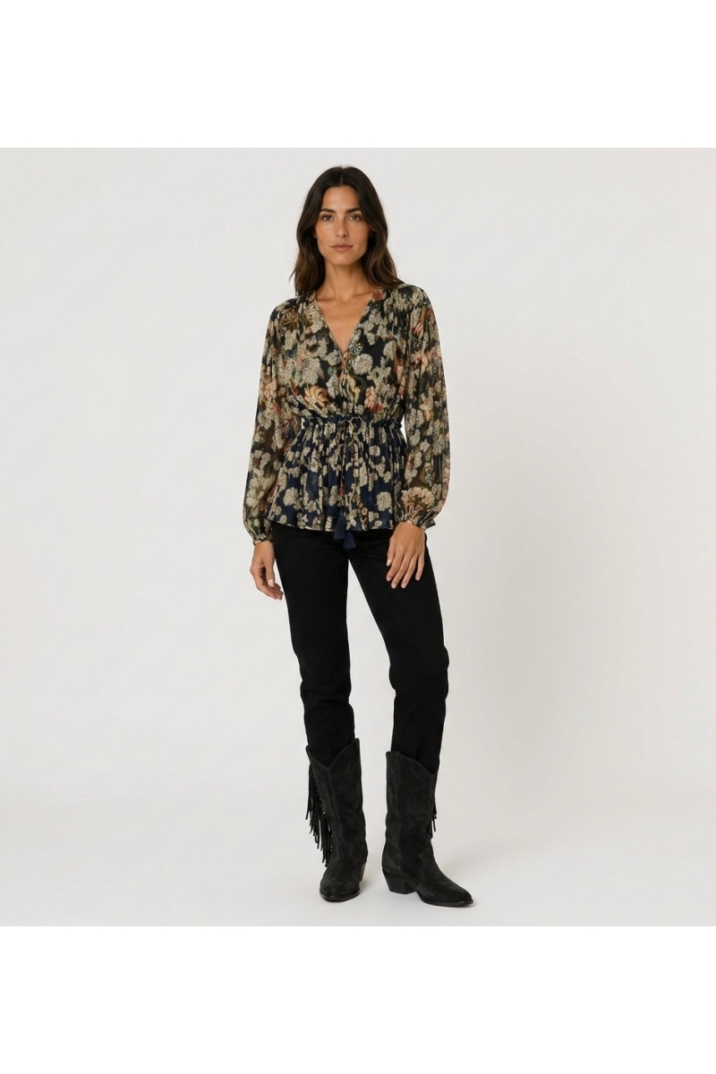 Navy blue long sleeve sheer blouse with colorful floral and gold leaf pattern, V-neck, and drawstring waist, front view.