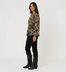 Navy blue long-sleeve V-neck blouse with colorful floral and gold leaf pattern, sheer fabric, and drawstring waist.