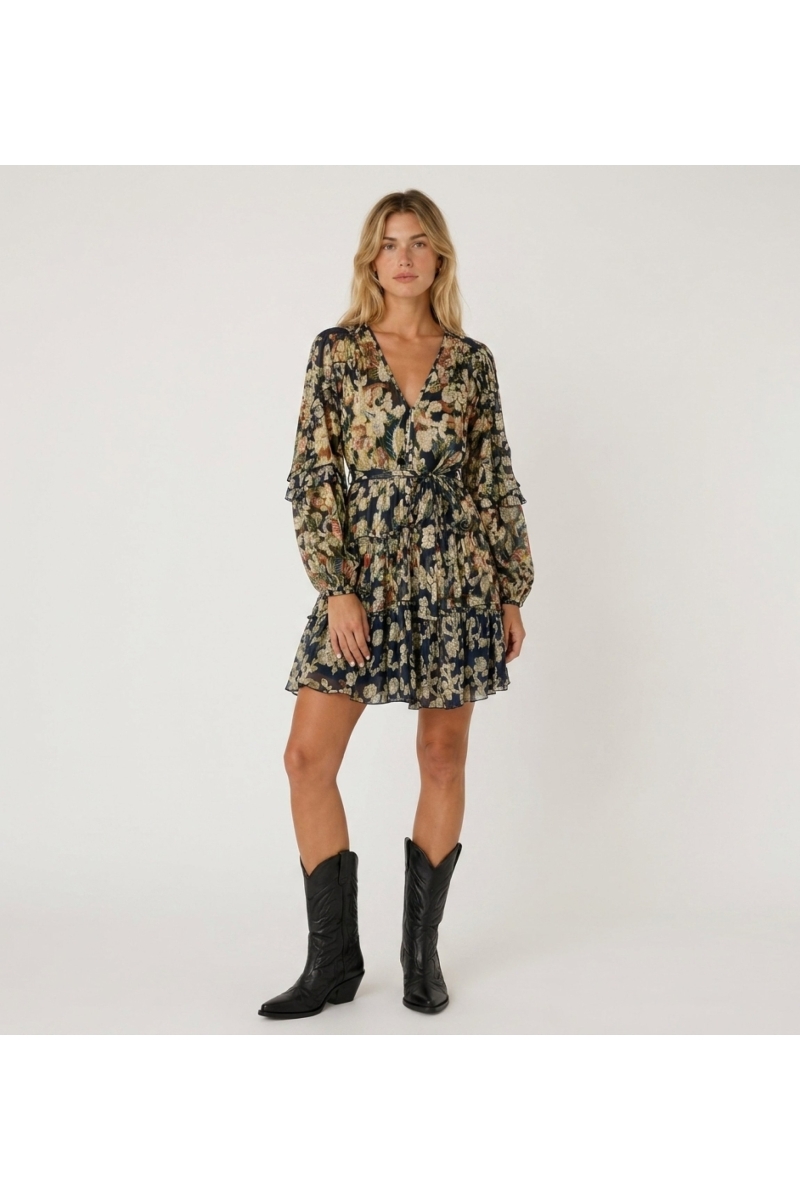 Front view of a navy blue short-sleeved V-neck dress with gold floral pattern, tiered skirt, and tie waist.