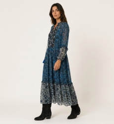Flowing blue, black, white floral print long sleeve tiered maxi dress. Loose fit, sheer lightweight fabric.
