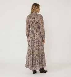 Back view of a light pink floral maxi dress with green/gold leaf print, high smocked neck, puff sleeves, and lace.