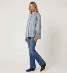 Women's light blue paisley blouse, long sleeve, high collar, button-down, ruffled cuffs.