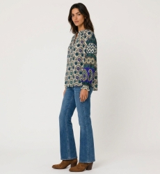 Three-quarter view: Cream long-sleeve blouse, blue and green floral pattern, contrasting balloon sleeves, lightweight fabric.