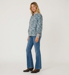 Elegant white women's blouse with a relaxed fit, made from lightweight fabric, shown in a three-quarter side view. Perfect for a