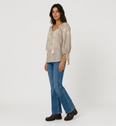 Brown and white striped peasant blouse with V-neck, three-quarter balloon sleeves, floral embroidery, tassels. Three-quarter sid