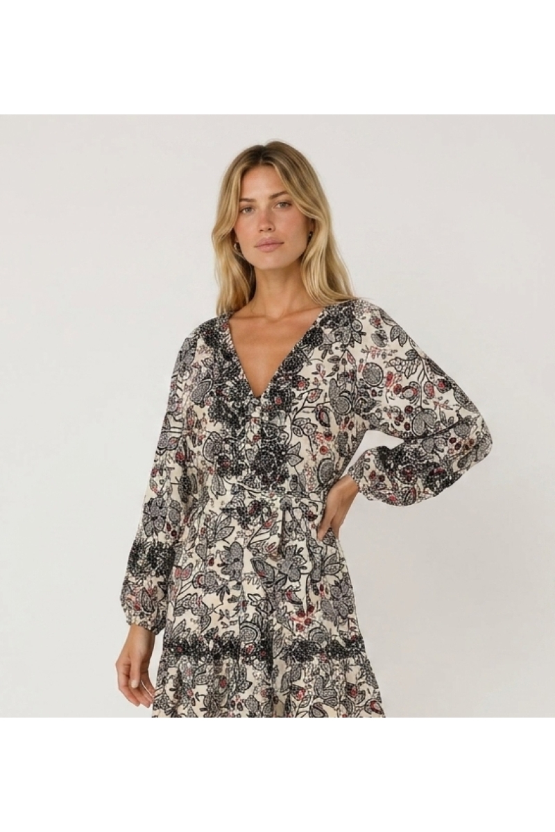 Cream mini-dress with black and red paisley pattern, V-neck, long sleeves, tiered skirt, tie-waist, lightweight fabric, three-qu