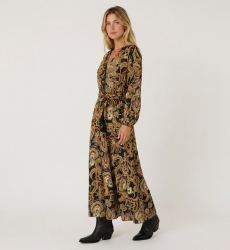 Black long-sleeve maxi dress with colorful paisley pattern, V-neck, tie-waist and flowing fabric, three-quarter view.