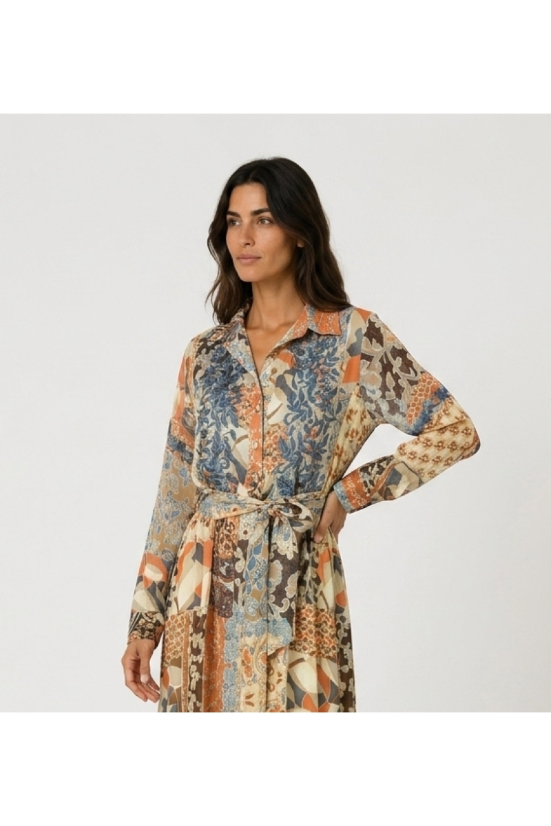 Long-sleeve maxi shirt dress with blue, orange & brown floral geometric patchwork. Lightweight fabric, tied waist.