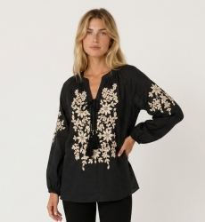 Black long-sleeve peasant blouse, v-neck with tie, cream floral embroidery, linen-look fabric, side view.