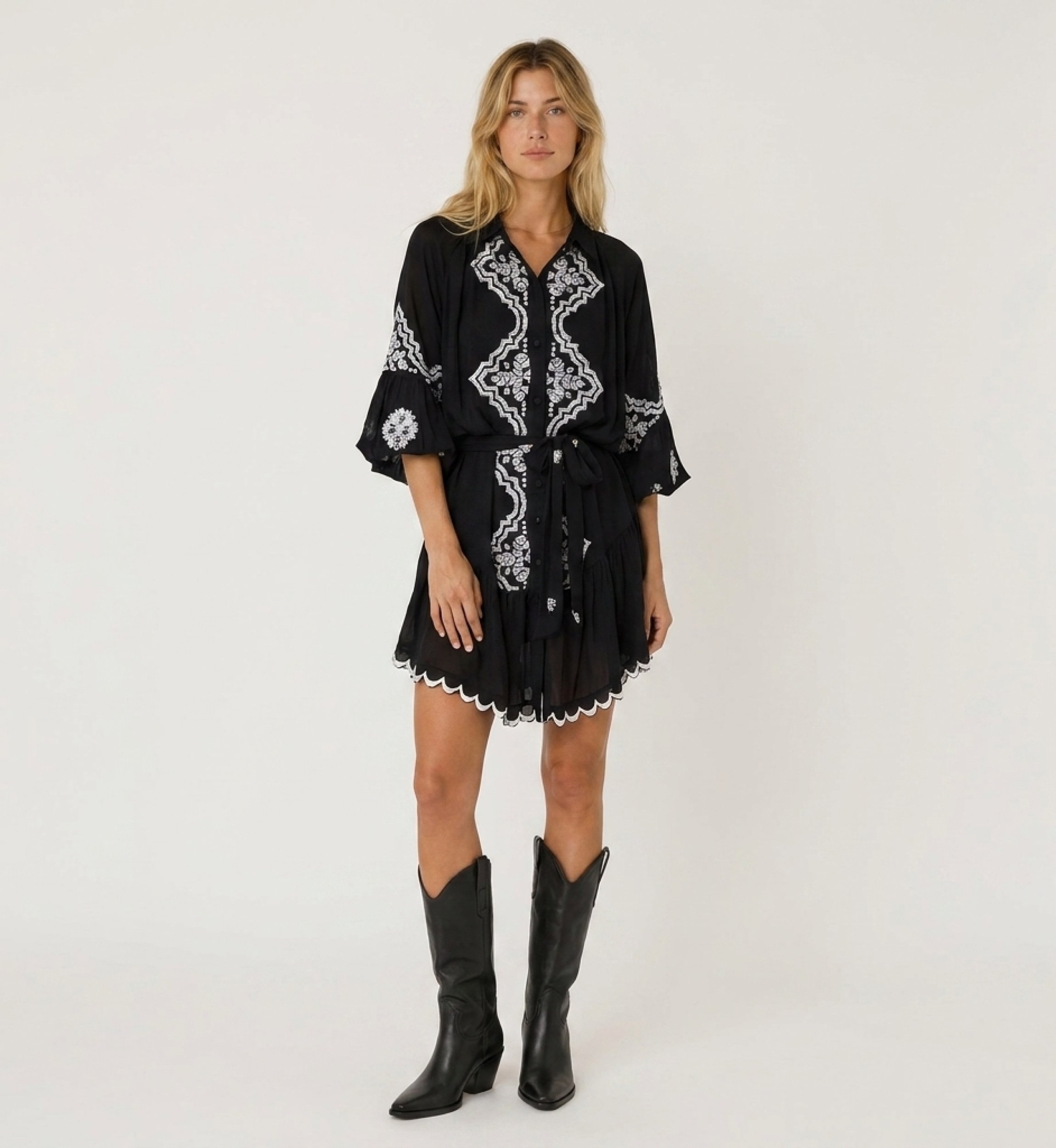 Front view of a chic short dress, elegant and versatile, perfect for various occasions, made from a light fabric.